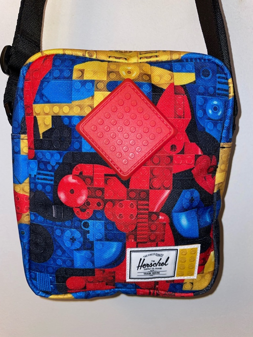 Herschel LEGO Multicolor Brick Print Crossbody Bag - Red, Blue, Yellow